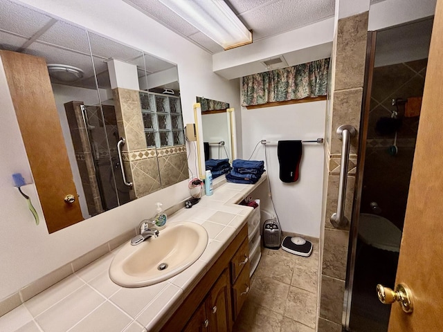 2445 Graham Rd, Belvidere, IL 61008 - full bathroom featuring visible vents, vanity, and a stall shower