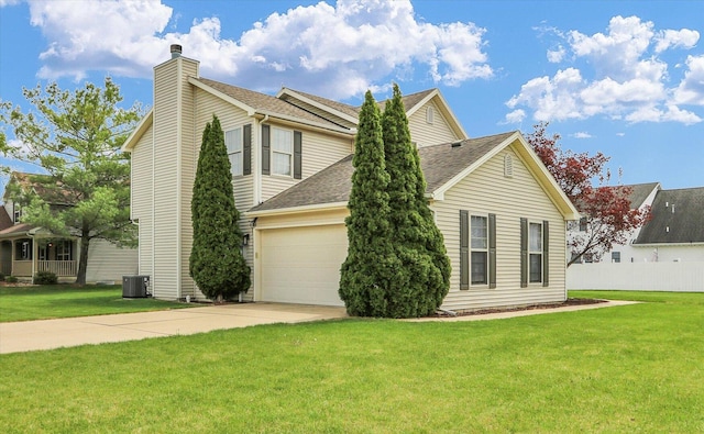 view of side of property with a shingled roof, central AC, a chimney, a yard, and driveway