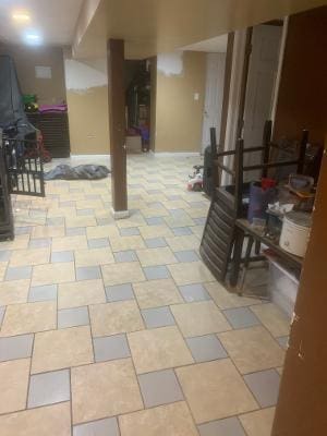basement featuring baseboards