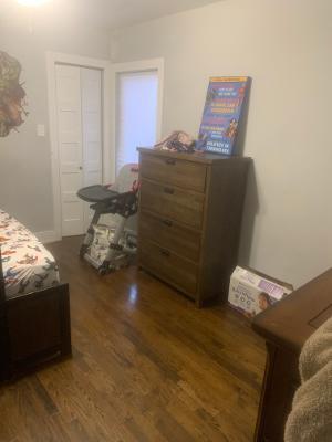 bedroom featuring wood finished floors
