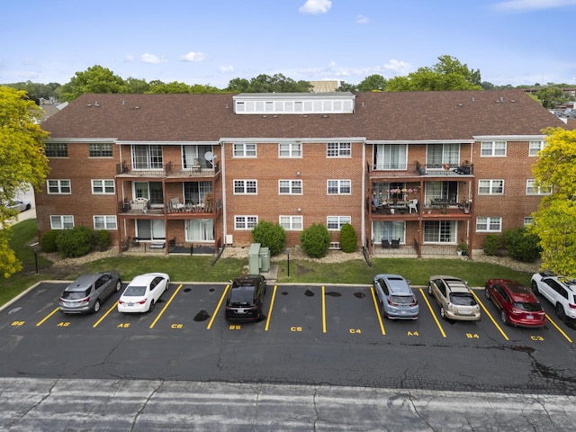 6135 W 94th St Unit C5, Oak Lawn, IL 60453 - view of building exterior featuring uncovered parking