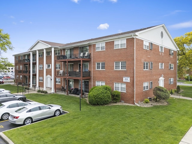 6135 W 94th St Unit C5, Oak Lawn, IL 60453 - view of apartment building / complex featuring uncovered parking