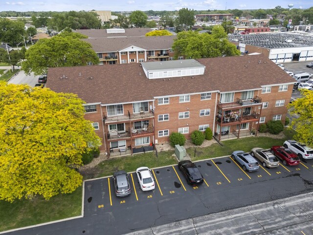 6135 W 94th St Unit C5, Oak Lawn, IL 60453 - view of building exterior featuring uncovered parking