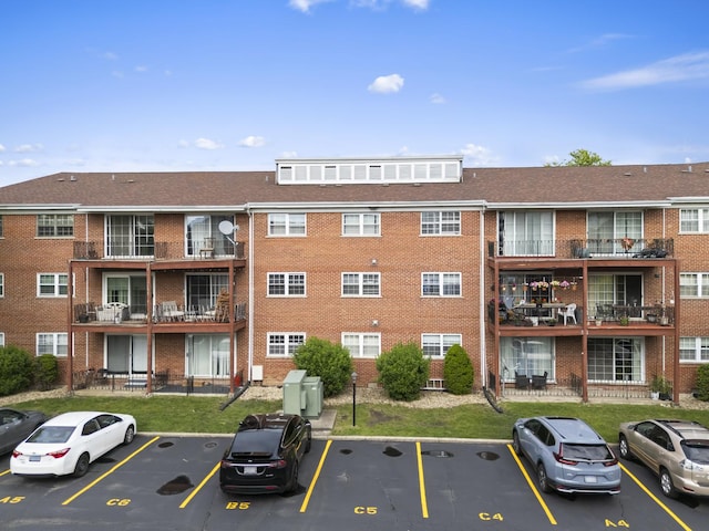 6135 W 94th St Unit C5, Oak Lawn, IL 60453 - view of apartment building / complex featuring uncovered parking
