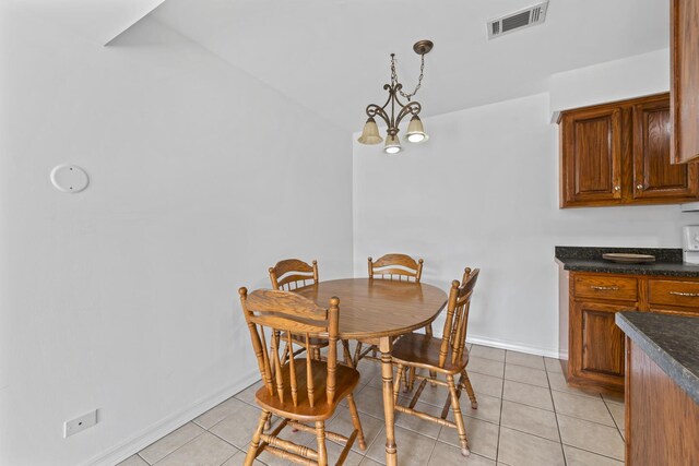 6135 W 94th St Unit C5, Oak Lawn, IL 60453 - dining area featuring light tile patterned flooring and baseboards