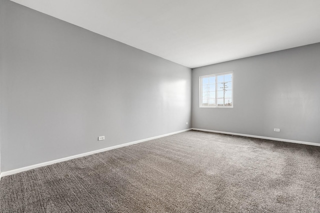 169 Waterbury Cir, Oswego, IL 60543 - unfurnished room with carpet floors and baseboards