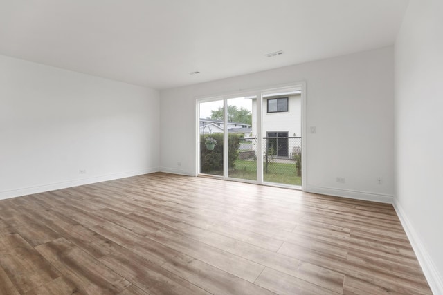 1062 Matfield Ct Unit 1062, Schaumburg, IL 60193 - unfurnished room featuring light wood-type flooring and baseboards