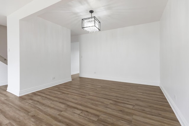1062 Matfield Ct Unit 1062, Schaumburg, IL 60193 - unfurnished dining area featuring wood finished floors, baseboards, and a chandelier