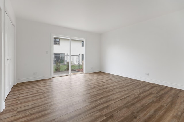 1062 Matfield Ct Unit 1062, Schaumburg, IL 60193 - spare room featuring wood finished floors and baseboards