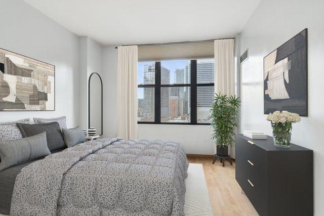 bedroom with light wood-style flooring