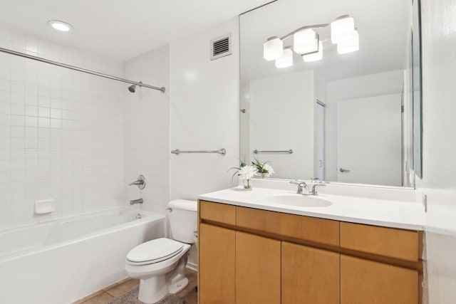 full bath with visible vents, bathtub / shower combination, vanity, tile patterned floors, and toilet