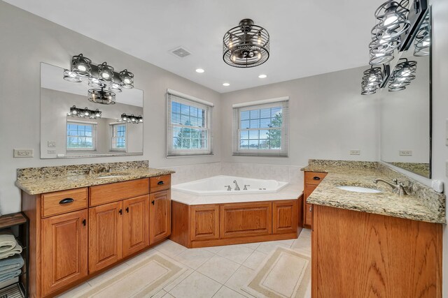 5255 Crescent Green Ct, Morris, IL 60450 - full bath featuring two vanities, visible vents, tile patterned floors, and a sink