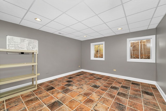 5255 Crescent Green Ct, Morris, IL 60450 - spare room featuring a paneled ceiling and baseboards