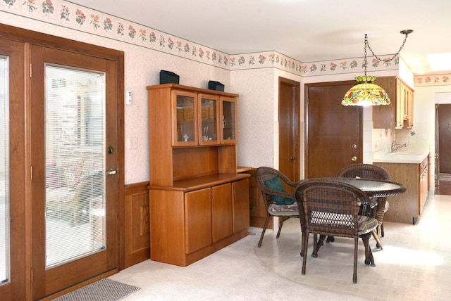 interior space featuring a wainscoted wall