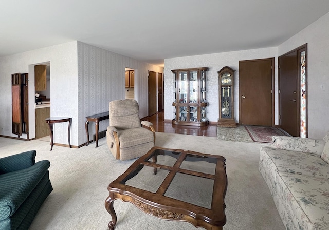living area featuring carpet floors