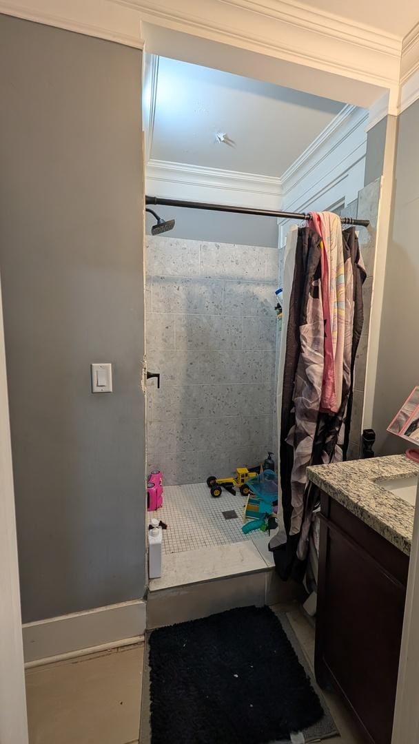 3039 W Flournoy St, Chicago, IL 60612 - bathroom featuring a shower stall, ornamental molding, and vanity