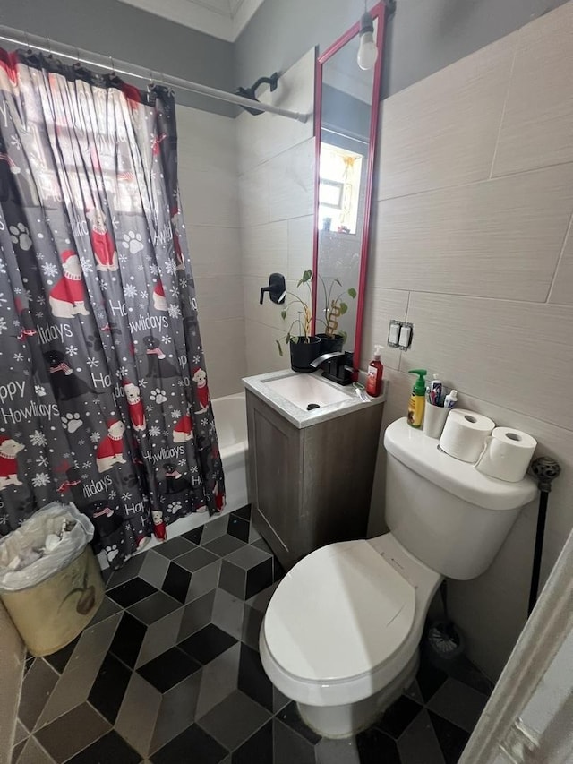 3039 W Flournoy St, Chicago, IL 60612 - bathroom with tile walls, vanity, toilet, and shower / bath combo