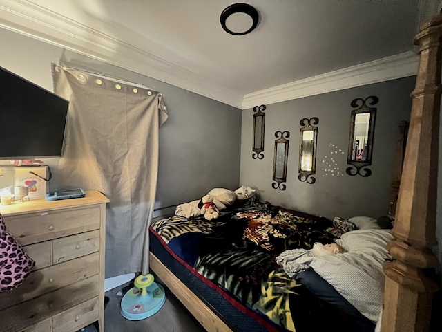3039 W Flournoy St, Chicago, IL 60612 - bedroom featuring wood finished floors and crown molding