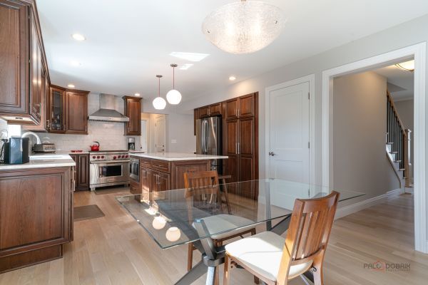 dining room featuring stairway, baseboards, light wood-style floors, and recessed lighting