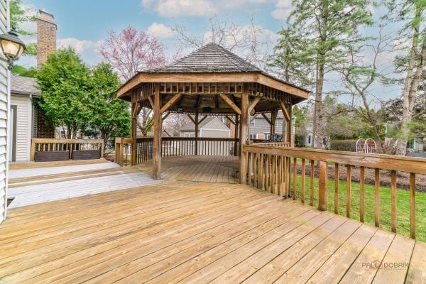 wooden deck featuring a gazebo
