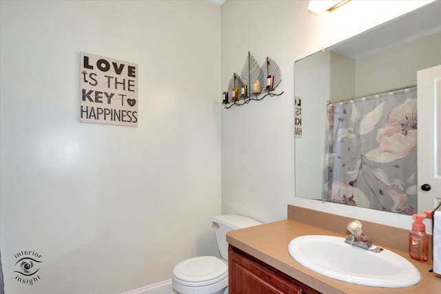 full bath featuring toilet and vanity