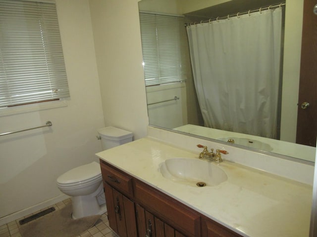 24541 S Wildwood Trl, Crete, IL 60417 - full bathroom featuring baseboards, visible vents, vanity, and toilet
