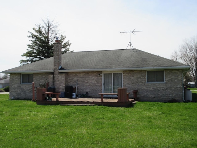 24541 S Wildwood Trl, Crete, IL 60417 - back of property with brick siding, a yard, and a deck