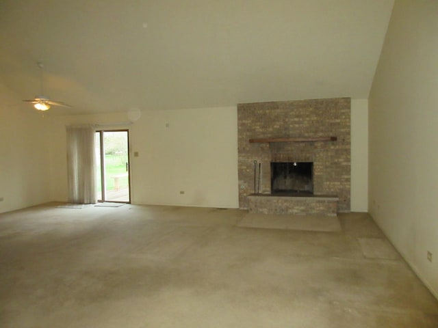 24541 S Wildwood Trl, Crete, IL 60417 - unfurnished living room featuring a fireplace, vaulted ceiling, carpet, and ceiling fan