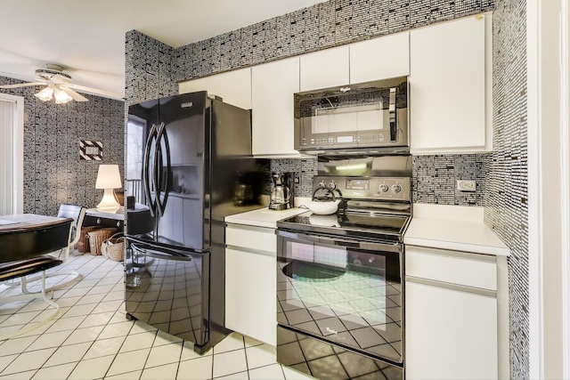 kitchen featuring ceiling fan, light countertops, black appliances, and light tile patterned flooring