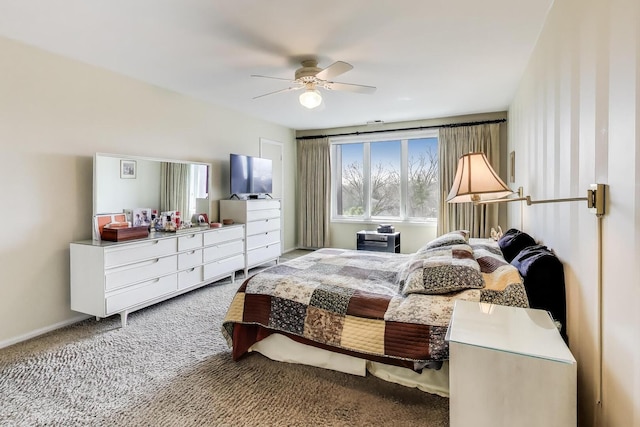 bedroom featuring baseboards, carpet, and ceiling fan