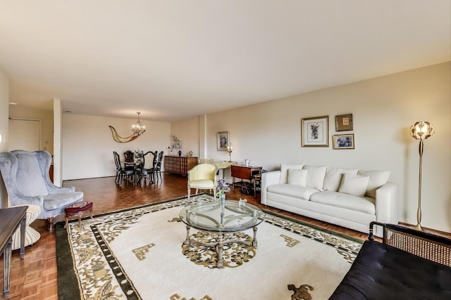 living room featuring a notable chandelier