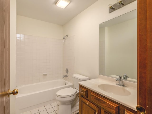 bathroom with tub / shower combination, tile patterned floors, toilet, and vanity