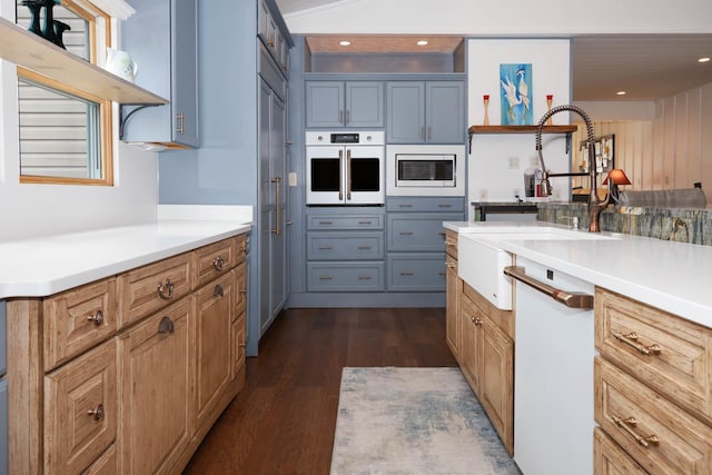 554 Fairway Dr, El Paso, IL 61738 - kitchen featuring a sink, dark wood finished floors, tasteful backsplash, recessed lighting, and white appliances