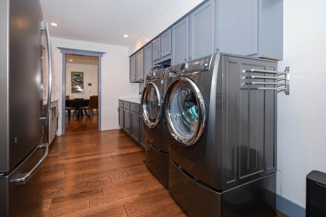 554 Fairway Dr, El Paso, IL 61738 - half bathroom with wood walls, wood finished floors, and toilet