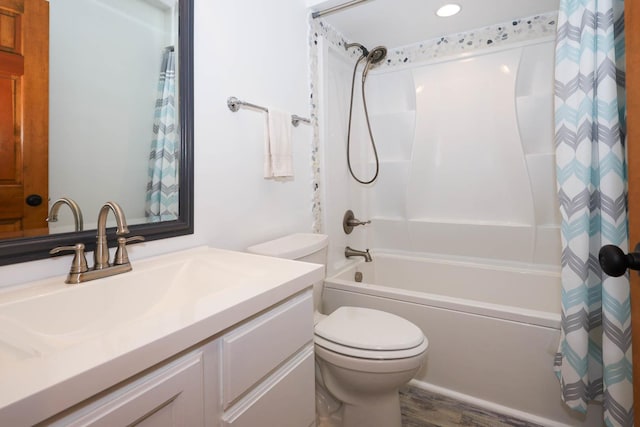 554 Fairway Dr, El Paso, IL 61738 - full bathroom featuring recessed lighting, wood finished floors, toilet, vanity, and shower / bath combo