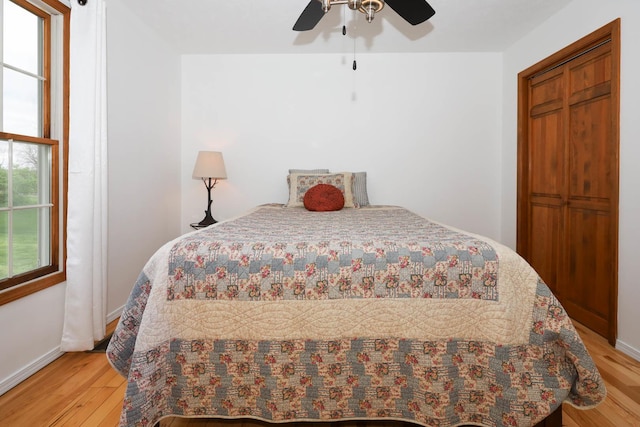554 Fairway Dr, El Paso, IL 61738 - bedroom featuring light wood-style flooring, baseboards, and a ceiling fan