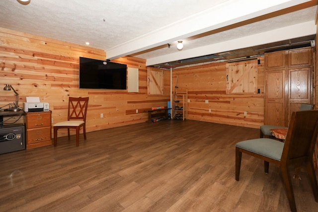 554 Fairway Dr, El Paso, IL 61738 - sitting room featuring dark wood-style flooring, beamed ceiling, and wooden walls