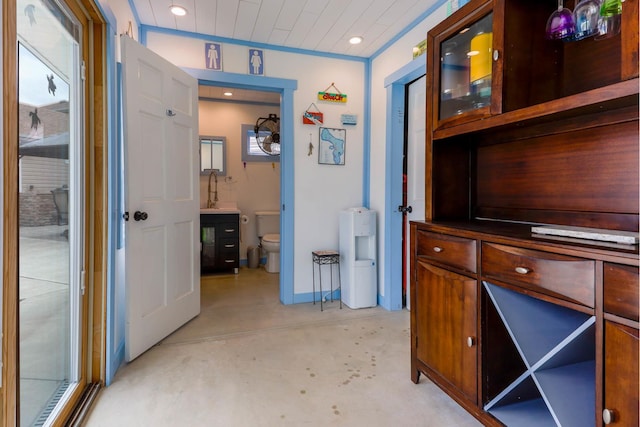 554 Fairway Dr, El Paso, IL 61738 - corridor with baseboards, concrete flooring, and recessed lighting