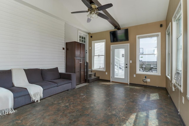 1926 County Road 2800 E, Minonk, IL 61760 - unfurnished living room with wood walls, lofted ceiling with beams, ceiling fan, baseboards, and stone finish floor