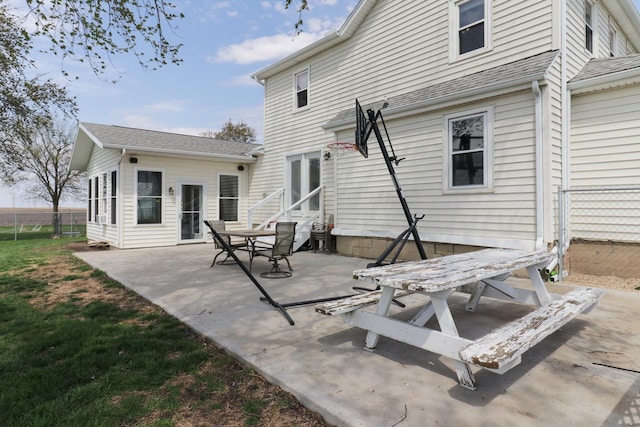 1926 County Road 2800 E, Minonk, IL 61760 - back of house featuring fence, a patio area, a shingled roof, and entry steps