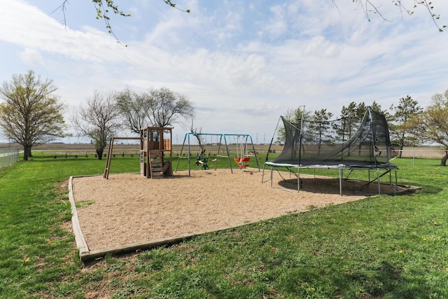1926 County Road 2800 E, Minonk, IL 61760 - community play area featuring a lawn, fence, and a trampoline