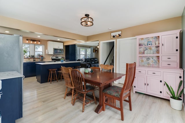 1926 County Road 2800 E, Minonk, IL 61760 - dining area with light wood-style floors and a healthy amount of sunlight