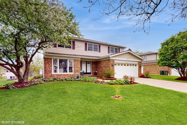 traditional-style home with a front yard, brick siding, an attached garage, and driveway