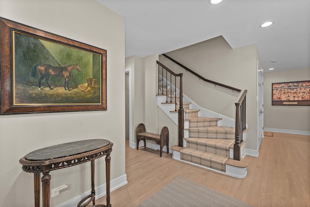 20 Colony Ln, Deerfield, IL 60015 - stairs featuring wood finished floors, baseboards, and recessed lighting