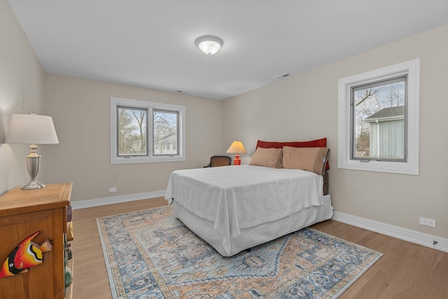 20 Colony Ln, Deerfield, IL 60015 - bedroom featuring light wood-type flooring and baseboards