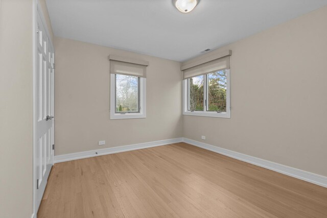 20 Colony Ln, Deerfield, IL 60015 - unfurnished room with light wood-style floors and baseboards