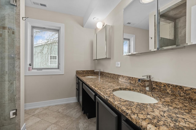 20 Colony Ln, Deerfield, IL 60015 - bathroom featuring baseboards, double vanity, tiled shower, and tile patterned floors