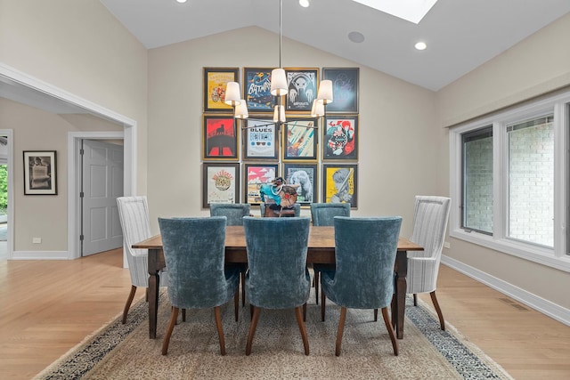 20 Colony Ln, Deerfield, IL 60015 - dining space featuring lofted ceiling, baseboards, a chandelier, recessed lighting, and a skylight