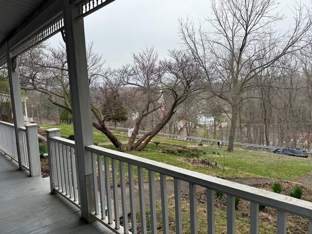 310 Elk St, Galena, IL 61036 - wooden deck with covered porch