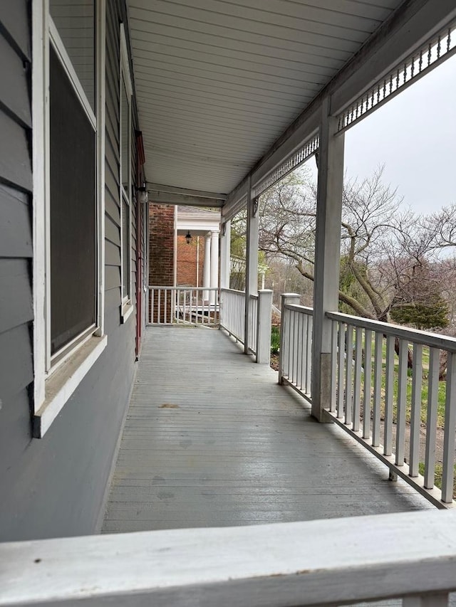 310 Elk St, Galena, IL 61036 - wooden deck featuring covered porch